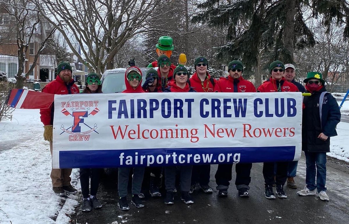FairportCrew's tweet photo. Rowers, families, and Mr. Weick braving the cold and marching in the St. Patrick’s Day Parade! 🍀 https://t.co/WWljlbNjlJ