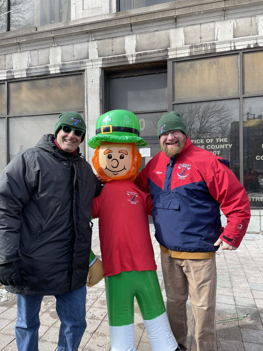 FairportCrew's tweet photo. Rowers, families, and Mr. Weick braving the cold and marching in the St. Patrick’s Day Parade! 🍀 https://t.co/WWljlbNjlJ