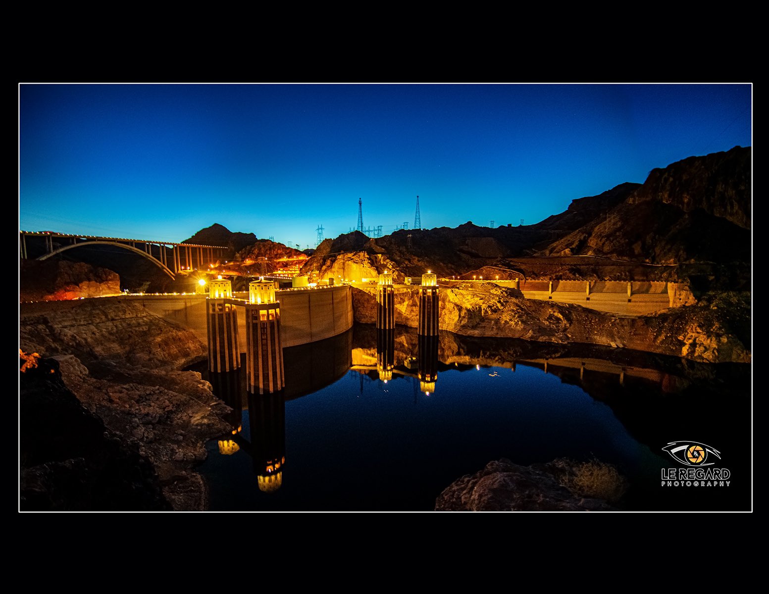 Spellbinding View Hoover Dam At Night A Spellbinding View Of The Hoover Dam Illuminated