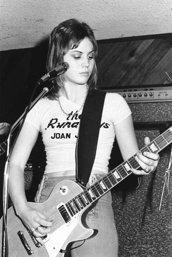Joan Jett playing guitar with The Runaways.