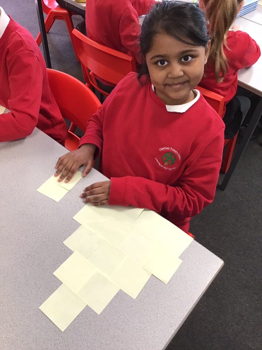 OakfieldY4's tweet photo. We’re using post it notes to make 2D shapes and then using them to help us calculate the shape’s area. What maths superstars we are! https://t.co/QFe9vHr3bS