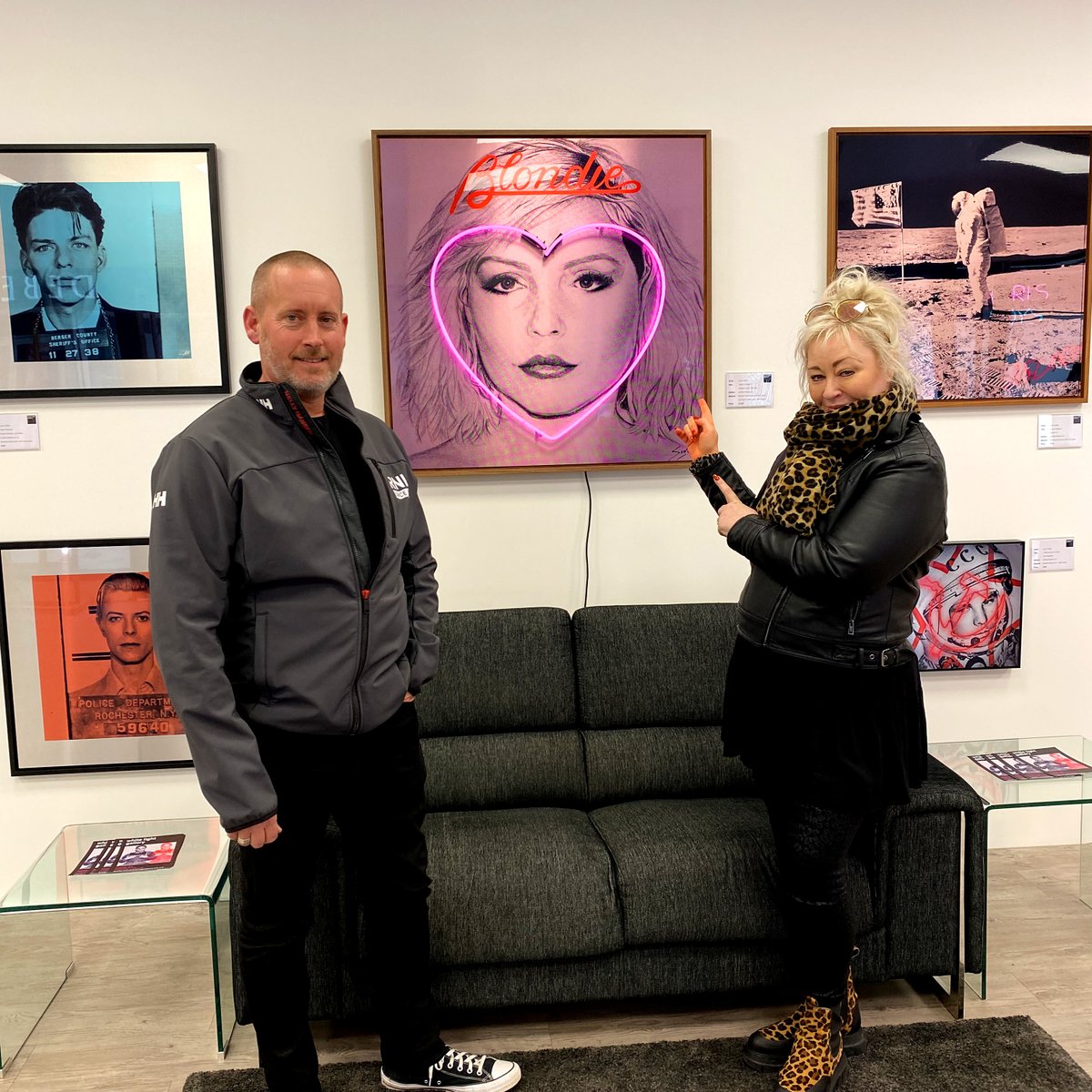 LouisSidoli's tweet photo. Some Louis Sidoli collectors visiting the gallery, pictured with their latest purchases: A Debbie Harry neon, Robert DeNiro (Taxi Driver) neon and a selection of aluminium artworks! 
#louissidoli #whitelightgallery #bellcourt #stratforduponavon #neonart #neonartist #neonartwork https://t.co/eMt0MlsC0G