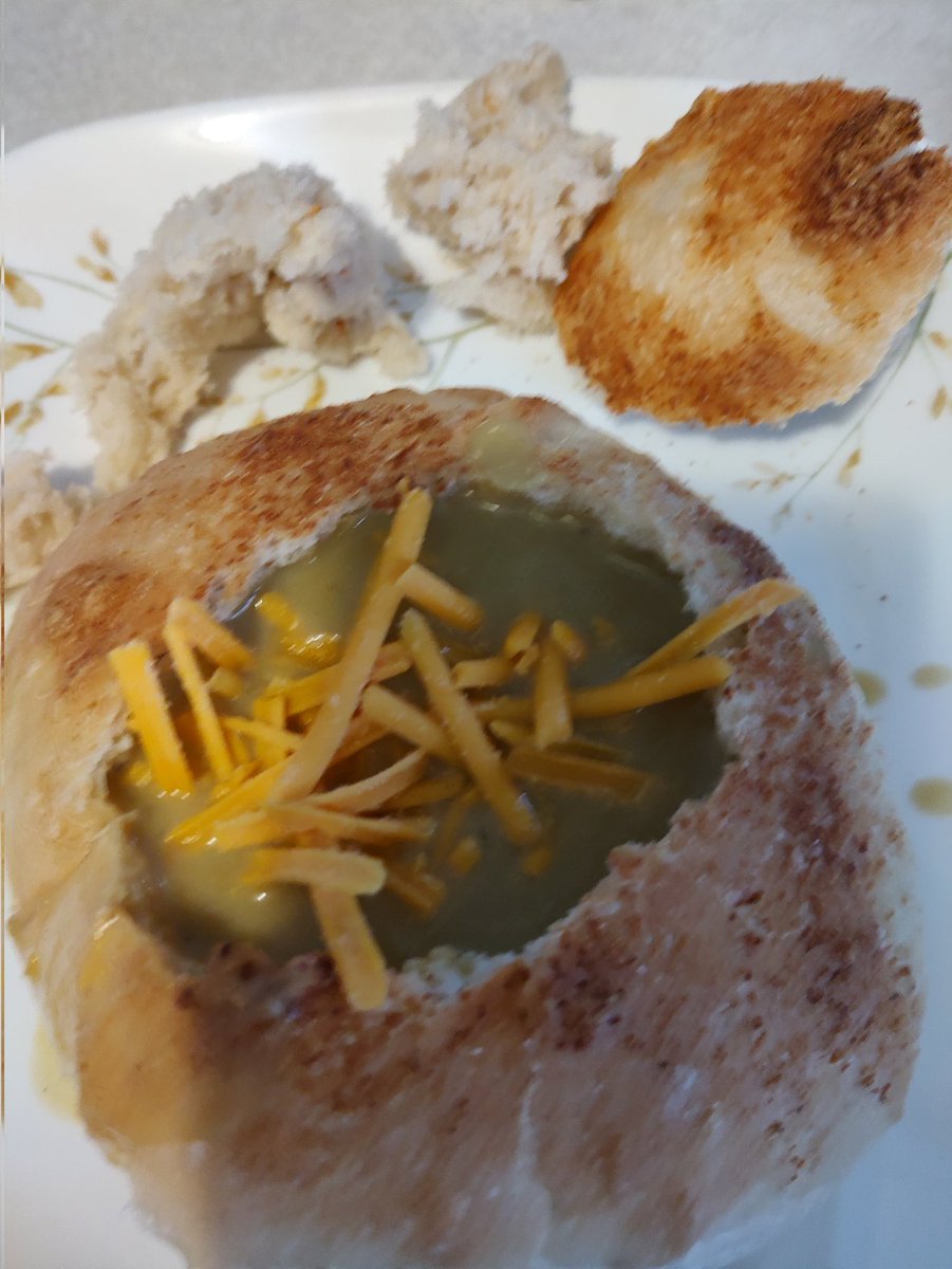 Broccoli Chedda Soup in a homemade bread bowl. From the book #unbelievablyvegan Both kids liked it but probably not the smartest idea to give a bowl of soup to an almost 2 year old who likes to dump food onto his tray.  #vegan #soup #kidapprovedfood #yummy