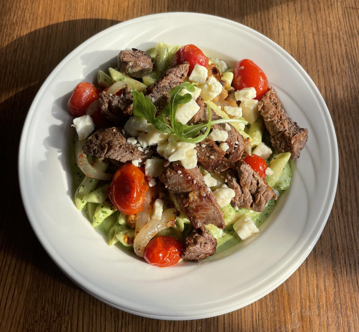 TheToastedFrog's tweet photo. Beef tenderloin tips, tossed in a creamy arugula pesto sauce with cherry tomatoes, yellows onions and penne, topped with feta. #pastanight #toastedfrog https://t.co/pxNw0YhGfD