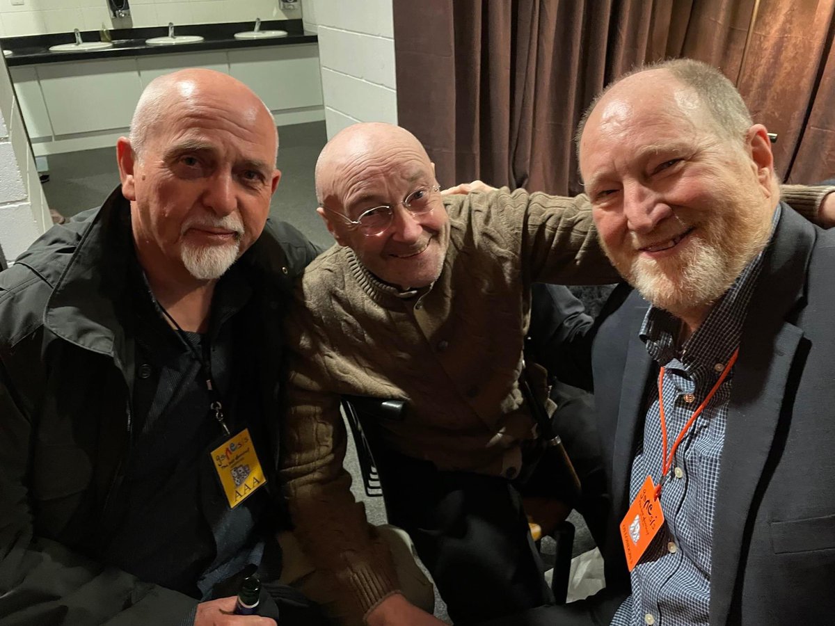 From tonight’s final #Genesis show in London (from left): #PeterGabriel, #PhilCollins, and Richard McPhail (long time friend and tour manager in the ‘70s). If you’ve not read Richard’s book on Genesis, you should. <a href="/genesis_band/">Genesis</a> <a href="/itspetergabriel/">Peter Gabriel</a> <a href="/PhilCollinsFeed/">Phil Collins</a>