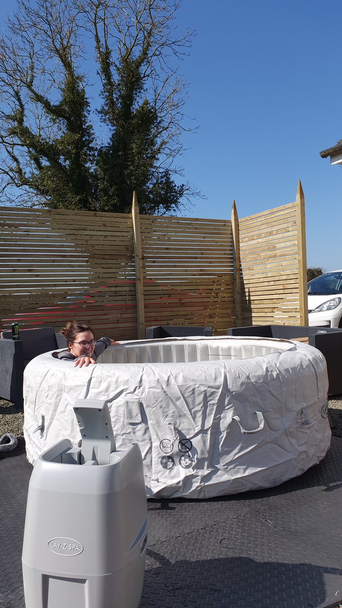 Spike_irl's tweet photo. I havent even got the water in yet and Mrs Spike is already testing out the Hot tub #hottub #layzspa https://t.co/G4X7OT3hJQ