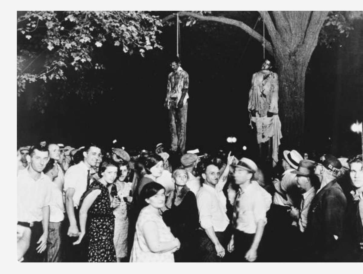 theoccupier's tweet photo. @alexlarman 'demanded that she be lynched for her transgressions' THIS is a lynching: note the skin tones of the victims and perpetrators. Hope this helps. https://t.co/27sQkaa3KA