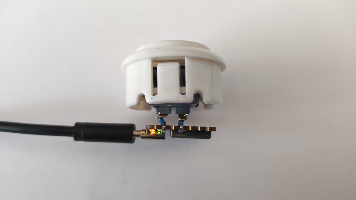 fabaff's tweet photo. Now, I have my own "video call mute button". No more "Ctrl+something" when using my Bluetooth speaker.

@seeedstudio XIAO with some #CircuitPython, a push button, two short wires and Fimo. Done!

Demo code for Teams: https://t.co/GQX14QnNT8 https://t.co/7UuVK7wSwM