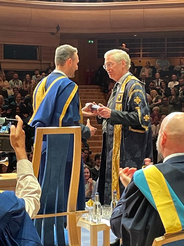 AstroBioPrice's tweet photo. Wonderful to finally receive my doctorate alongside @pmstreeter &amp; @planetpegg, take a seat on stage with @_vic_pearson &amp; @OlssonKaren &amp; join the #OUFamily! Well worth the two-year wait 🥳 #astrobiology https://t.co/aQfpIynxte