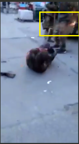 What is also very strange: you can see (and hear) a shoot (the second), and the smoke is also visible in front on the trouser.Seems that the shooting was next to the leg.The guys goes on the ground without even moaning.Of course, there is no blood coming out of his leg later