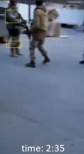 If I am not mistaking (the vid quality is very poor), one of the servicemam standing with a gun seems to have white armband (possible legband too).
