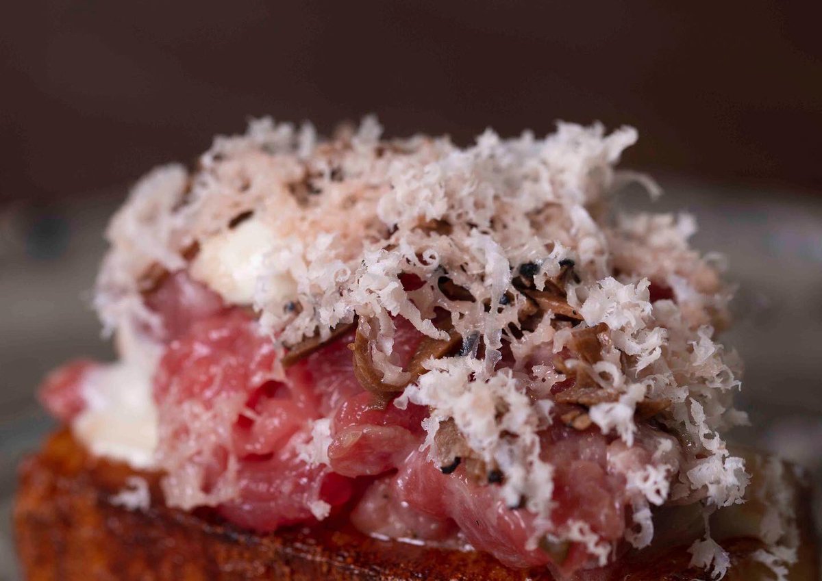 Hello gorgeous! 

Beef fat potato terrine, beef fillet, truffle, blue cheese with shaved smoked bone marrow by Stacey Leith. 

#foodphotography