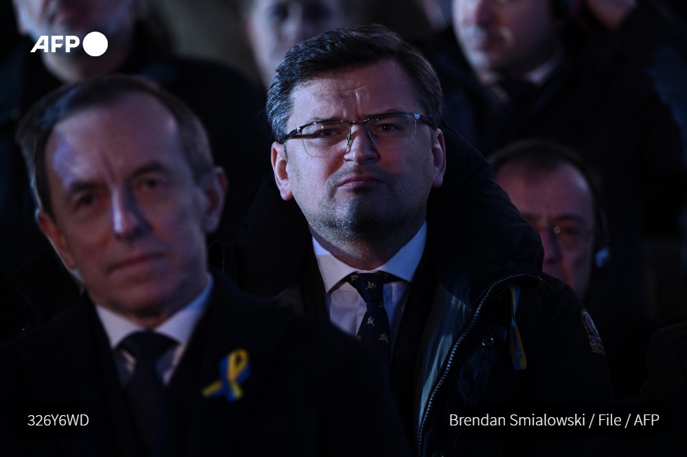 AFP's tweet photo. #UPDATE Ukrainian Foreign Minister Dmytro Kuleba called on Sunday for a global boycott of French retail giant Auchan, with pressure mounting on international brands to quit Russia over Moscow's invasion of Ukraine https://t.co/C4WtJpnlKA https://t.co/e5Zmqz15xn