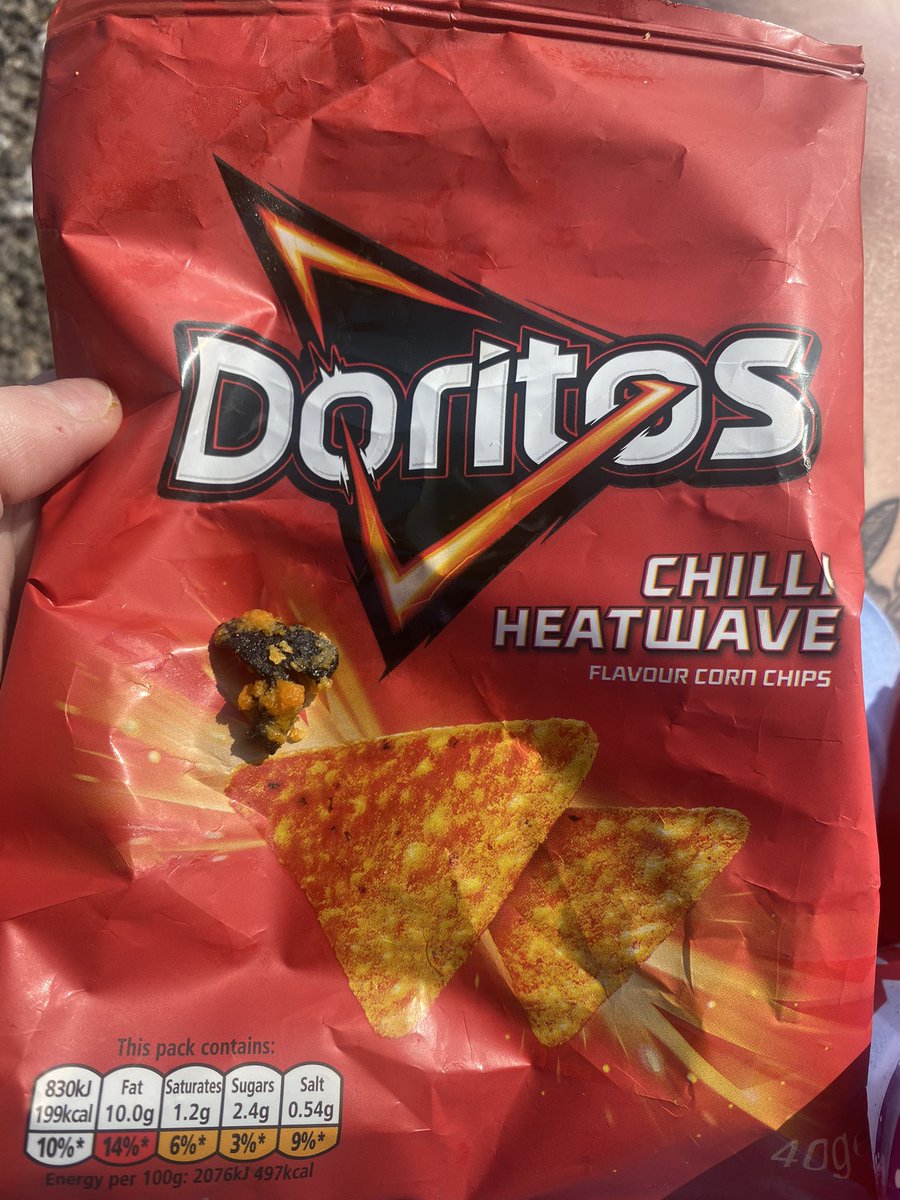 JLeigh994's tweet photo. @Doritos why is there tarmac in my sons packet of crisps https://t.co/FvBu8BKE4K