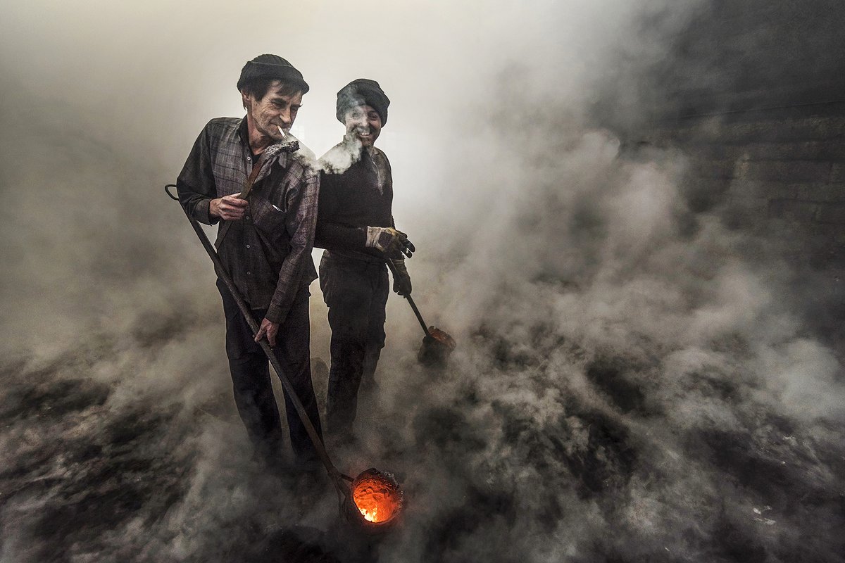 @cripixtoff Smoke" 
The time for chitchat and opportunity for smoking cigarettes during short breaks in the casting works. This man is lighting his cigarette with molten iron. The smoke of the cigarette is mixing with the dense smoke in the environment.

0.40 $eth

foundation.app/@SavasSener/cs…