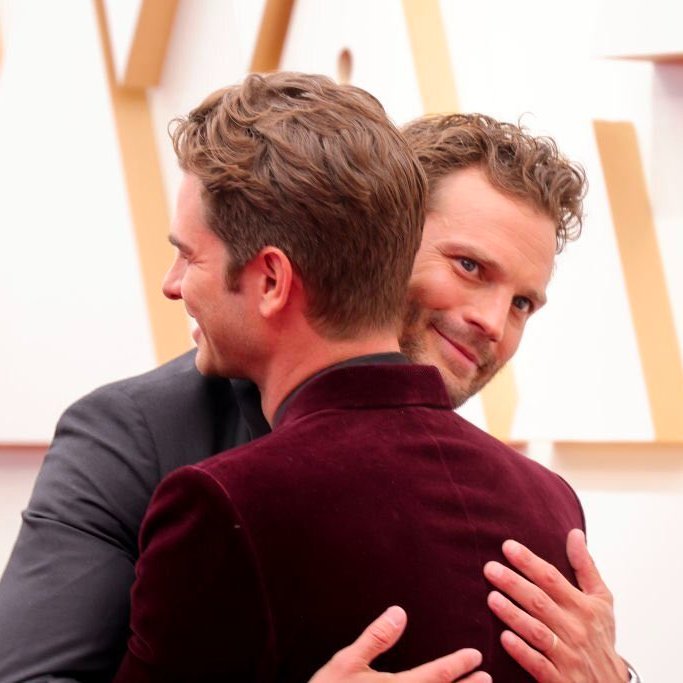 TIFF_NET's tweet photo. No thoughts, just Jamie Dornan hugging Andrew Garfield. #Oscars https://t.co/hZOyFv87ds