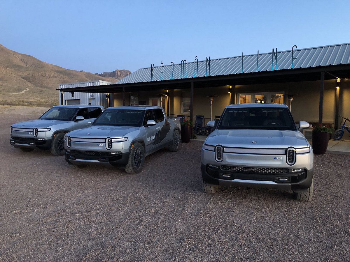 In addition to marking the altitude at which space begins, the “Karman Line” is also the name of the end-of-the-day gathering place for those in training at Blue Origin’s Astronaut Village. Note also the Rivian electric trucks out front that can transport folks around the site.