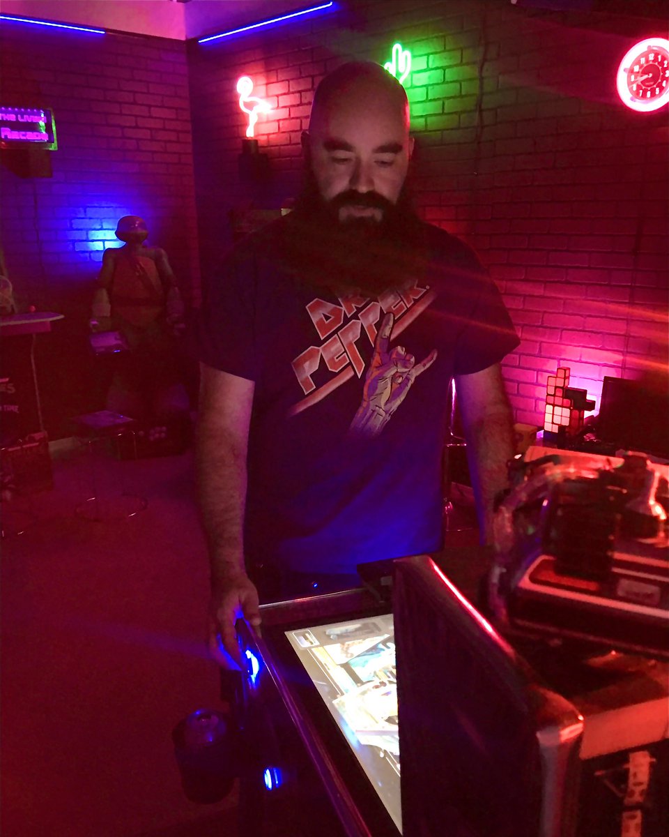 Candid shot of me playing in my arcade/twitchstudio/living room. Snapped by an old friend visiting. A cool angle I don’t get to show on stream. #virtualpinball #pinball #homearcade #arcade #neonaesthetic #TwitchStreamers