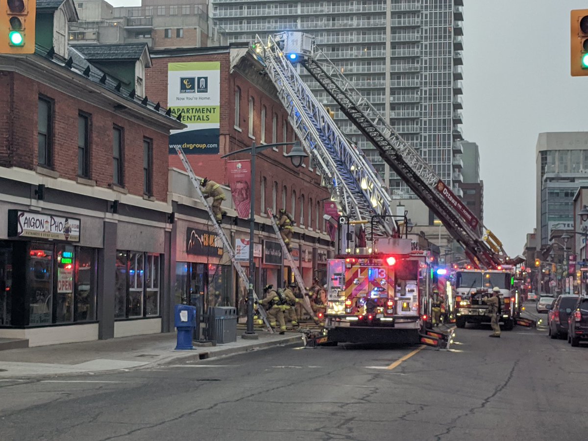 OFSFirePhoto's tweet photo. Ottawa Fire on scene of a 3-Alarm fire on Bank ST between Nepean &amp; Lisgar STs. Fire is in a ground business in a 3-storey mixed use row. The main body of fire is knocked down. Overhaul and salvage operations in progress. No reported injuries. #ottnews #OttFire #ottcity https://t.co/XIF7uLFvzd