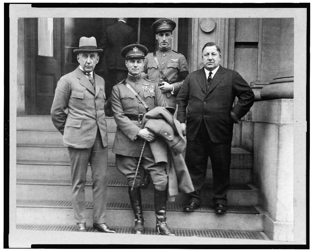 Polar explorer Roald Amundsen (left) meets with American aviation experts in Washington, D.C.: