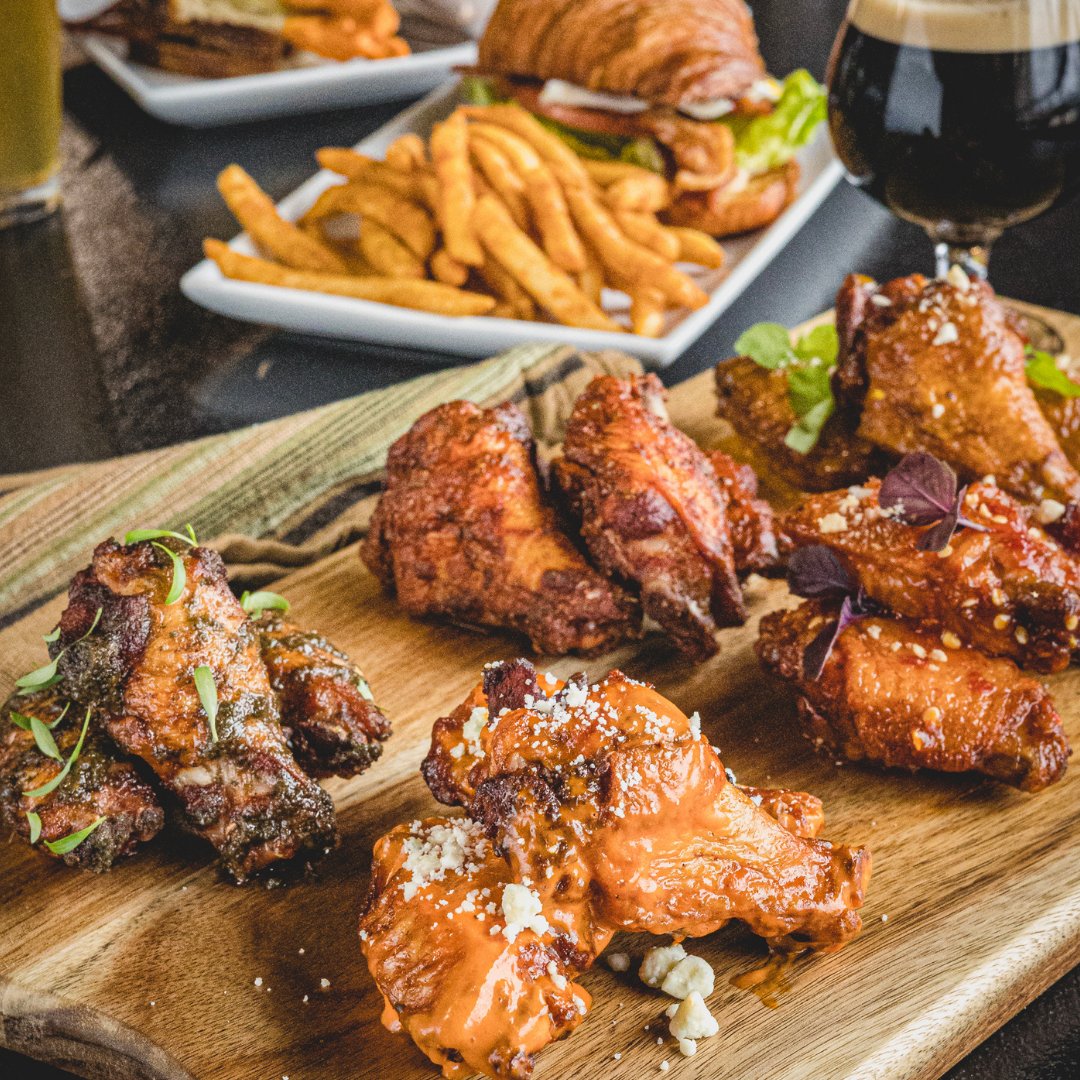 With fun twists like house-fermented buffalo sauce, fresh lemon, and cotija cheese, our wings are winners. 🍋 You can have a go at any of our four mouth-watering flavors and a pint every Monday, for only $13! Stop by!