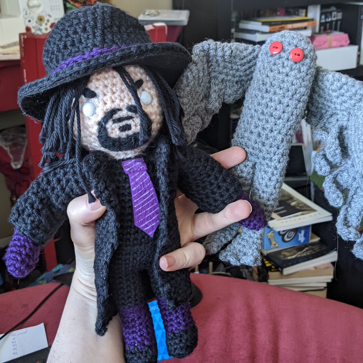 KaliButterfly's tweet photo. I got my #Undetaker crochet from @blissardz! It's perfect! And now I can answer the age old question of who would win in a fight, The Undertaker or Mothman. #wwe https://t.co/Uf83Z94JOC