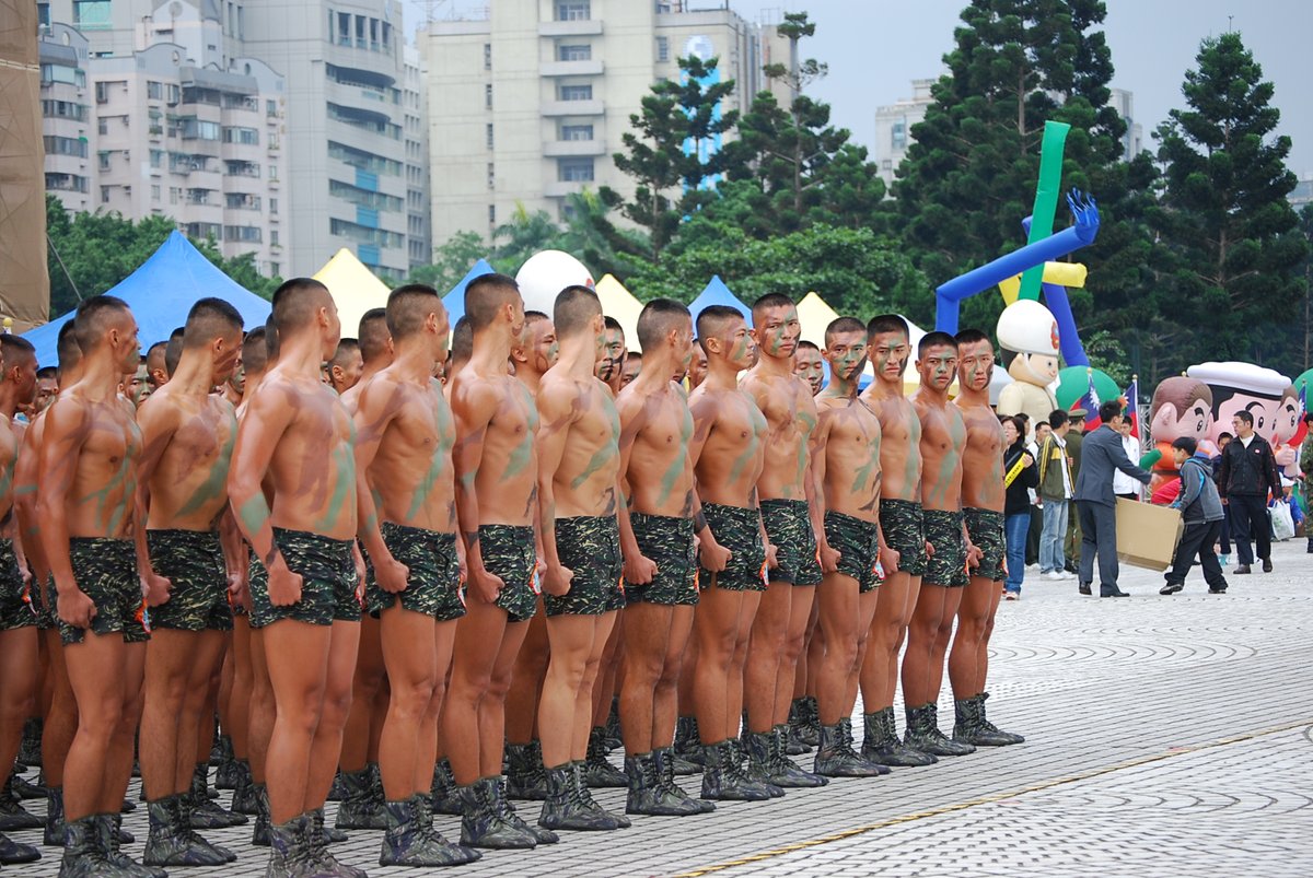 Strip them to THONGS, not shorts. Paint their bodies with camo paint. Let the public see that they are government property. Let the public see the muscles that must be sacrificed for them in war! 1 man not in proper position, make them all do 100 push-ups!