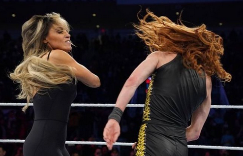 RT @nodqdotcom: Video: Trish Stratus slaps Becky Lynch at #WWE live event in Toronto https://t.co/lXO0i30AGe https://t.co/eLyntKU0nD