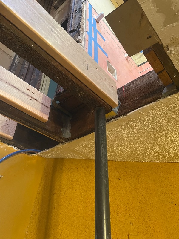 HabitatPhilly's tweet photo. A progress photo of floor joist repairs in a veteran’s home. In this home, Habitat’s team also installed new bathroom flooring, basement stairs, and did other basic systems upgrades thanks to @HomeDepotFound #veteransbuild #repaircorps #TeamDepot. https://t.co/dPx3UgReMD