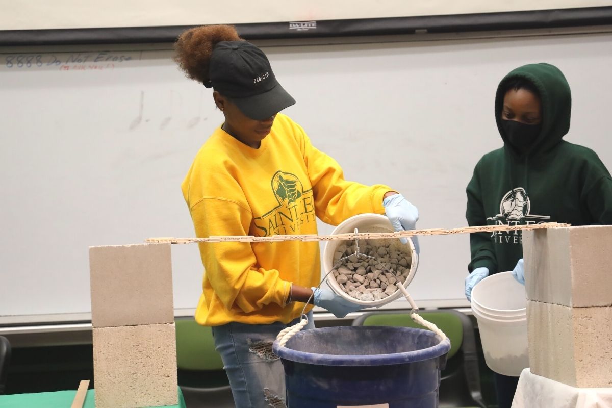 SaintLeoUniv's tweet photo. The Department of Natural Sciences recently hosted its annual bridge-building competition. To compete in this contest, Saint Leo and @pascoschools high school students were invited to construct Popsicle stick bridges. Check out a few of their creative bridge designs! https://t.co/q6MRtDQEIe