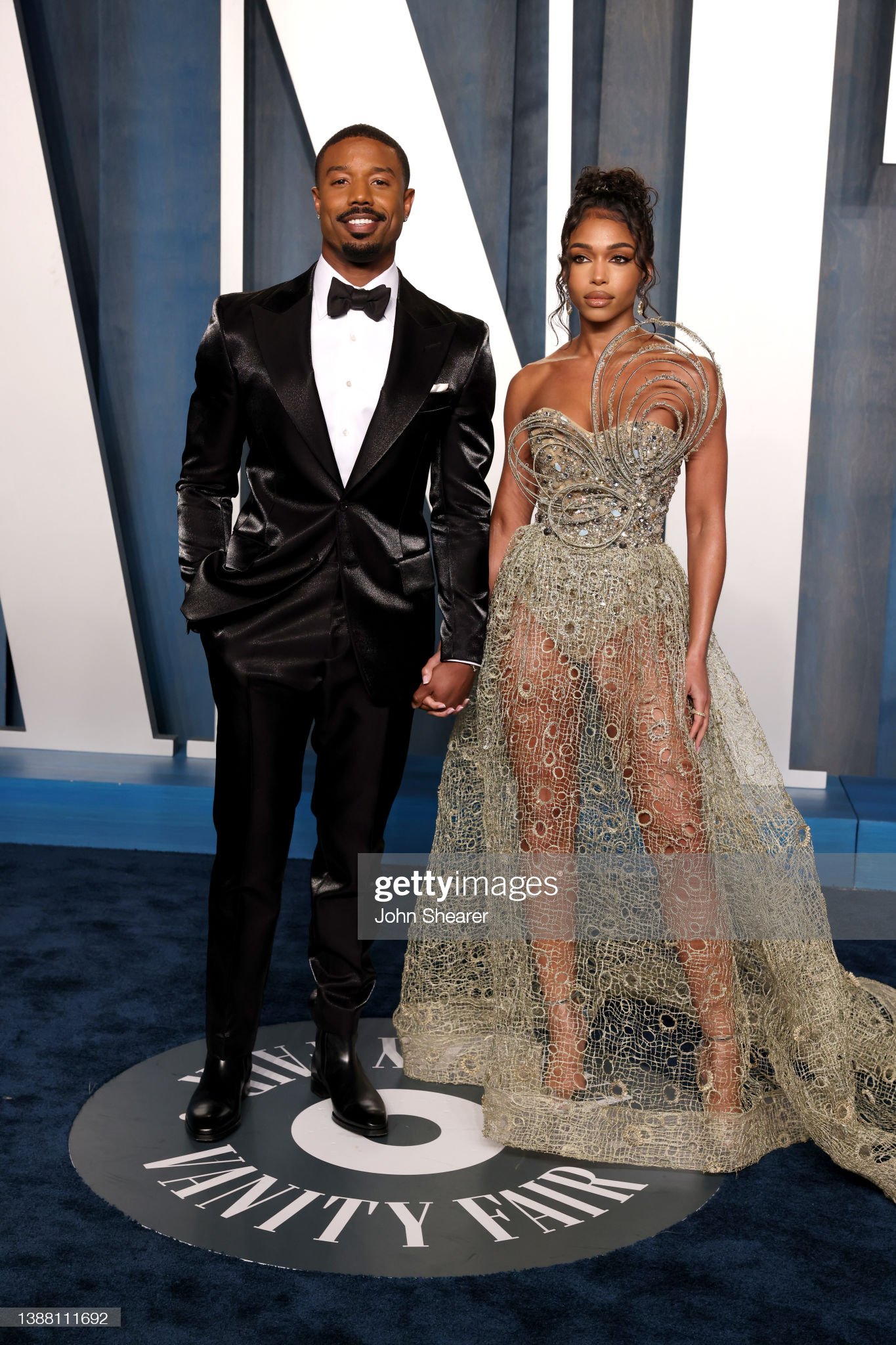 Jonathan Majors, left, and Michael B. Jordan arrive at the Vanity