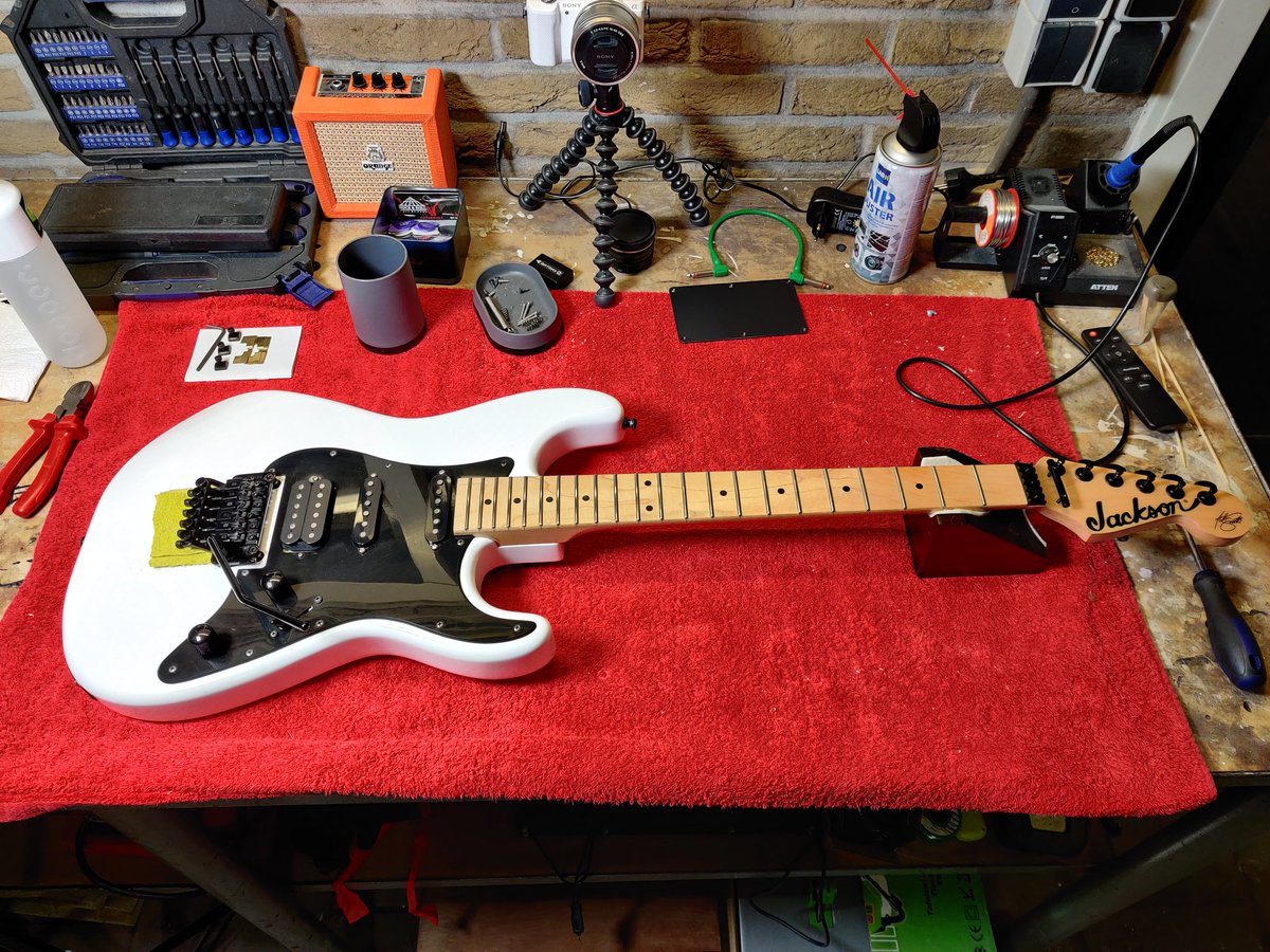 Installed two new single coil pickups with a push-pull pot for coil tapping, locking tuners and a smaller locking nut on this wonderful Jackson SDX. Cleaned up the internal wiring and now I'm just waiting on a new trem block so I can install a D-tuna and a trem stopper.