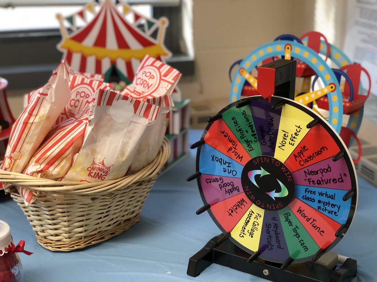 kerszi's tweet photo. For the next 7 days, I’m setting up this circus-themed “appreciation station” in the faculty rooms at my 7 elementary schools. The “1-Minute-Spin-It” wheel is full of #edtech ideas, sites, or apps that I can demo for busy teachers in a minute or less. 🎪
#MicroPD #WTPSEdTech https://t.co/1P0PaS8Dnp