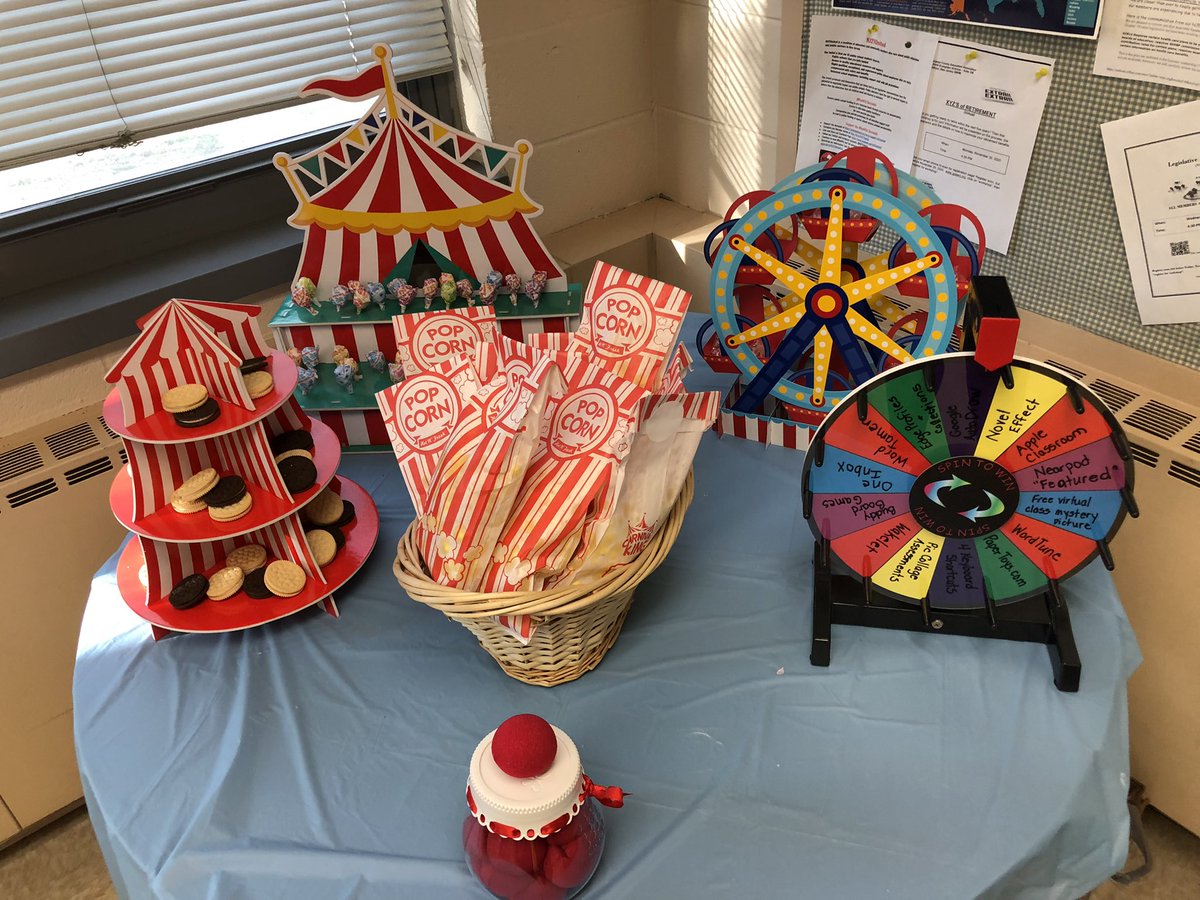 kerszi's tweet photo. For the next 7 days, I’m setting up this circus-themed “appreciation station” in the faculty rooms at my 7 elementary schools. The “1-Minute-Spin-It” wheel is full of #edtech ideas, sites, or apps that I can demo for busy teachers in a minute or less. 🎪
#MicroPD #WTPSEdTech https://t.co/1P0PaS8Dnp