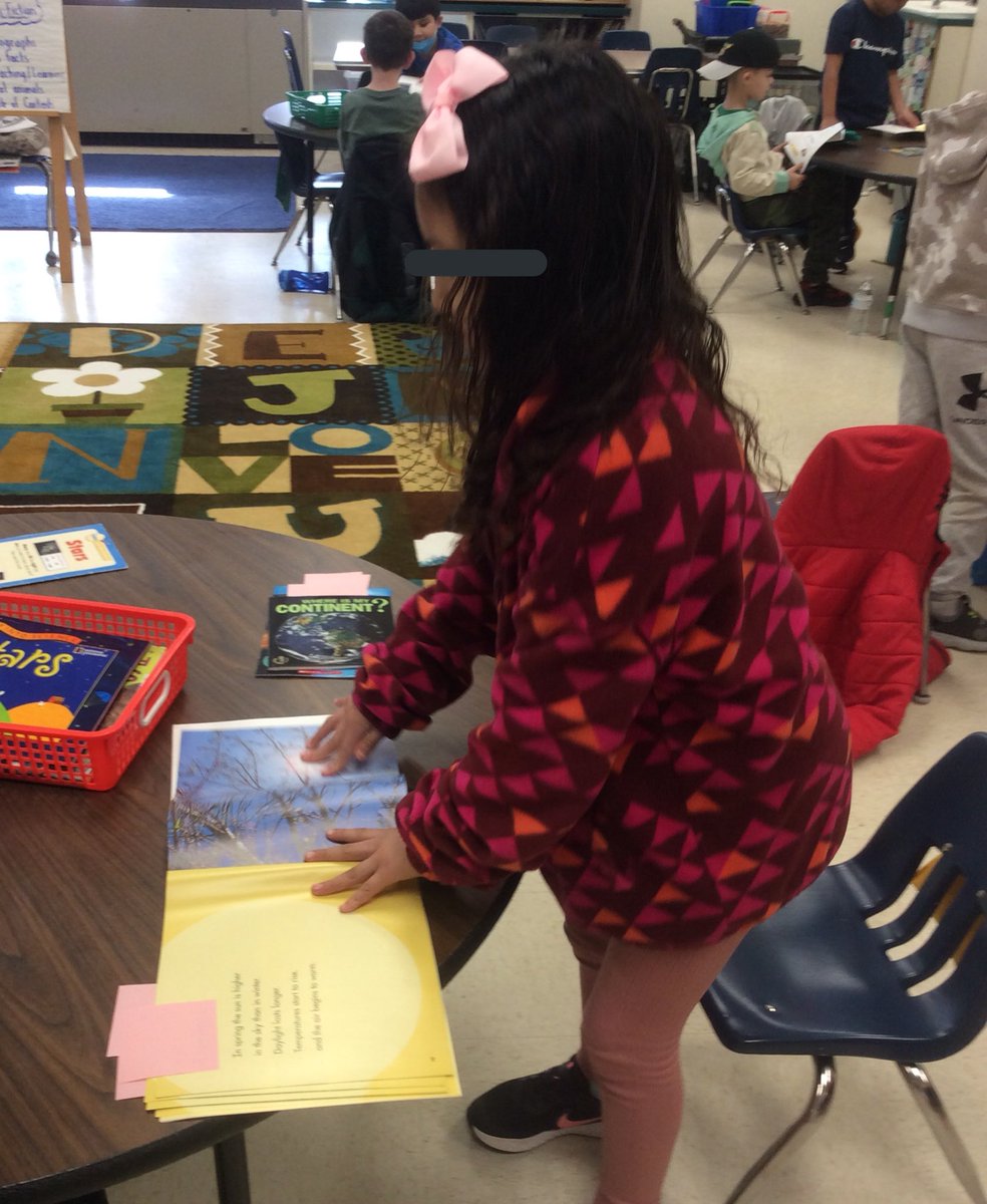 tchanatski's tweet photo. Students are on the hunt for non-fiction text features; I see a Table of Contents, Headings, a Diagram, & a Glossary!!✍️🧐📚@Hubbard_School @LanguageArtsRSD #immersion #balancedlit #mentortexts https://t.co/b1i7Ssi1NF