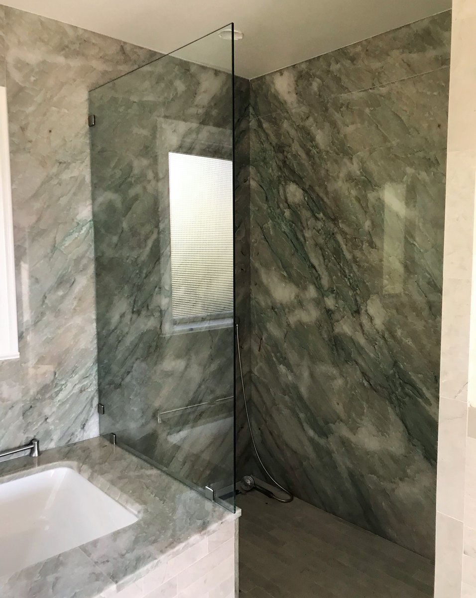 Loving this single panel shower glass install from the other day! Simple, sophisticated, and clean! #aaakartak #aaakartakinstalls #fasterandbettersince1956 #showerdesign #bathroomdesign #framelessshowerenclosure #showerpanel