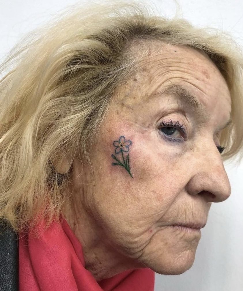 iBabyE's tweet photo. yooo i talked my grandma into getting a face tat 😭 https://t.co/oCtGhmkBk2