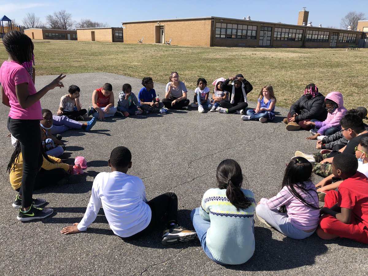 Ms_Clark_CHE's tweet photo. My student teacher Ms. Michels, @UDelaware is leading her science lesson on observable traits of organisms OUTSIDE!! Why listen to bird sounds on the computer when you can do it outside on this BEAUTIFUL day!! #chdreambuilders @nickbaker80 https://t.co/gWYJTaLHpU