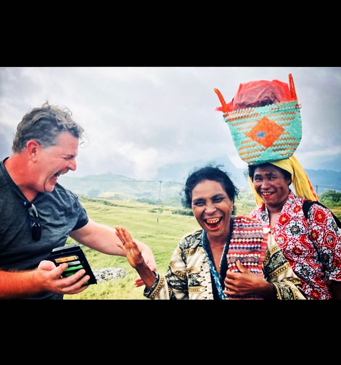 Pic 1: Two elderly women walking up a lonely mountain road in a remote southern district of #Timor Leste. 
Pic 2: The reaction when I say in broken Tetum I have a photo of a very beautiful woman I want her to see and then show her Pic 1. 
Thx for golden moment <a href="/karenshrosbery/">karenshrosbery(Kip)</a>