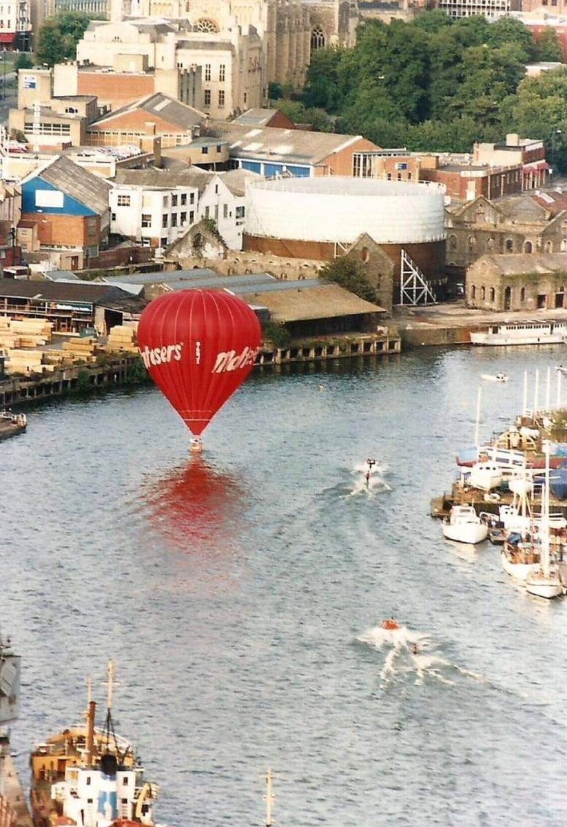 BallooningP's tweet photo. Throwback to Bristol Balloon Fiesta 1987, @MaltesersUK balloon goes for a splash in the docks. 🎈 https://t.co/6F6VpIOs9I