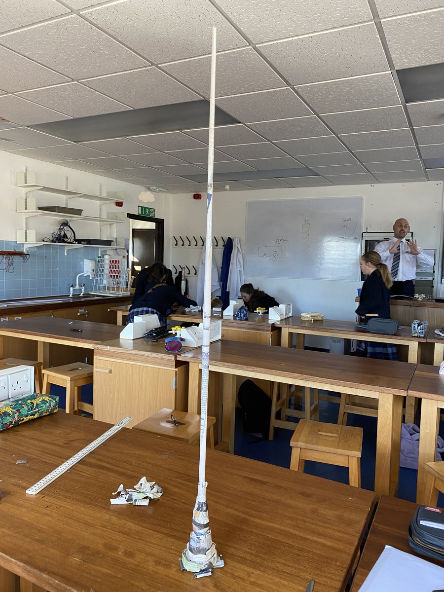 ScienceBHGirls's tweet photo. Celebrating British Science Week! Year 8 have been making HUGE towers out of 3 sheets of newspaper and 12in of sellotape! Linking the theme of Growth to physics! @BritSciAssoc @ScienceWeekUK https://t.co/iYZUOVWiyg
