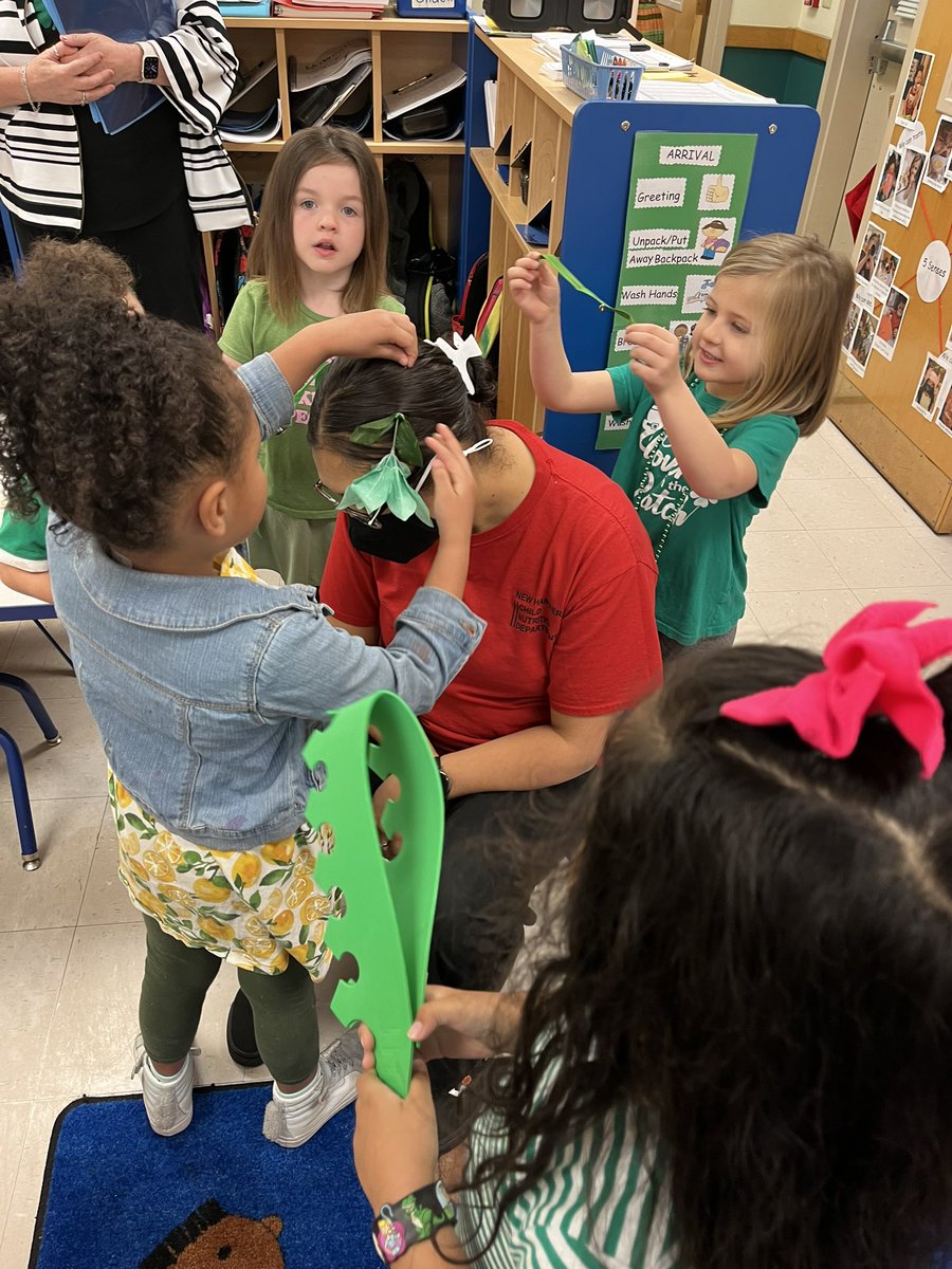 CreccSeaStars's tweet photo. Ms. Monica, our beloved cafeteria manager, needed a little green added to her work uniform.  These students in Mrs. Maxey’s class were more than happy to accessorise her!  #allthegreen #March17th #shesagoodsport 🍀 @JannaLennon @nhcsnutrition https://t.co/UkNjq4DzCg