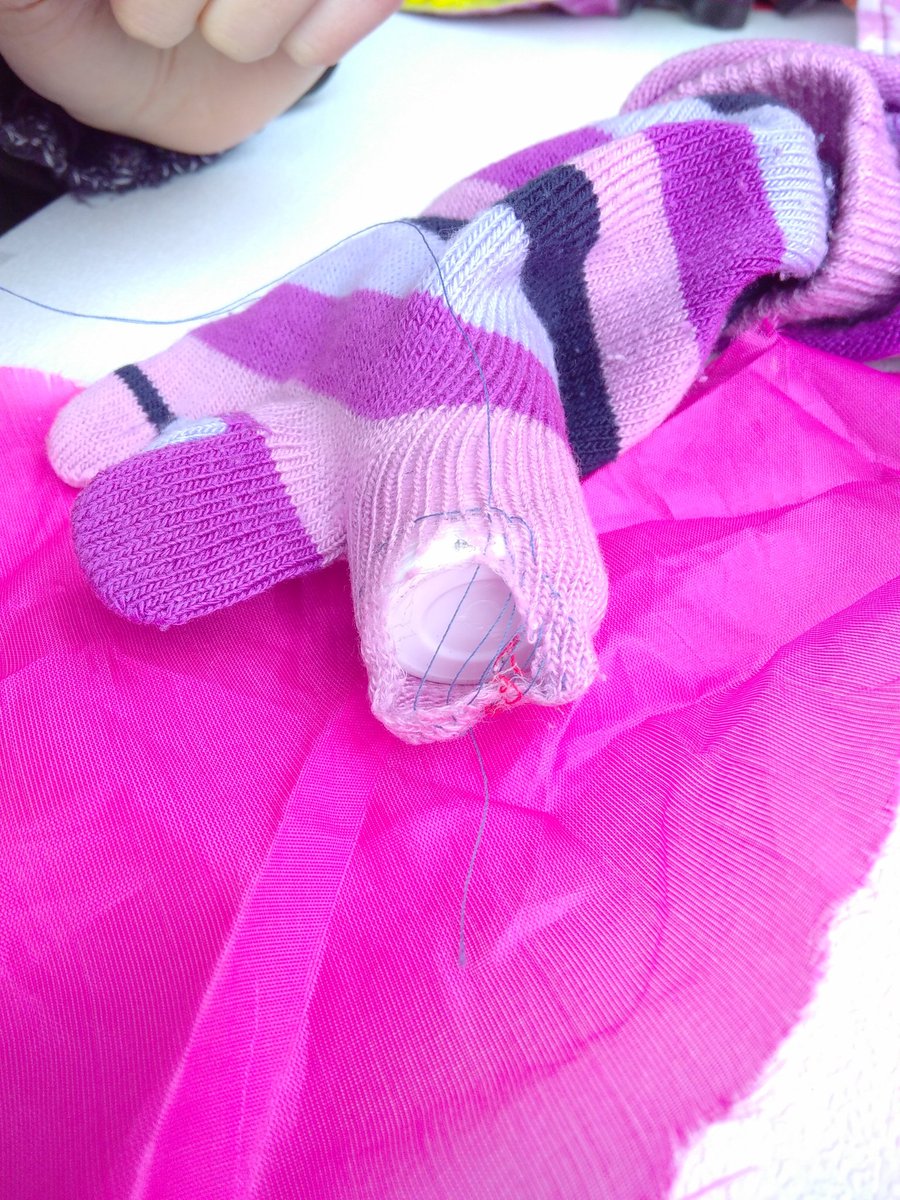 Excellent toe-darning in progress. This is an awkward mend, as we haven't had access to a small darning mushroom - a glue stick is doing the job(ish)!