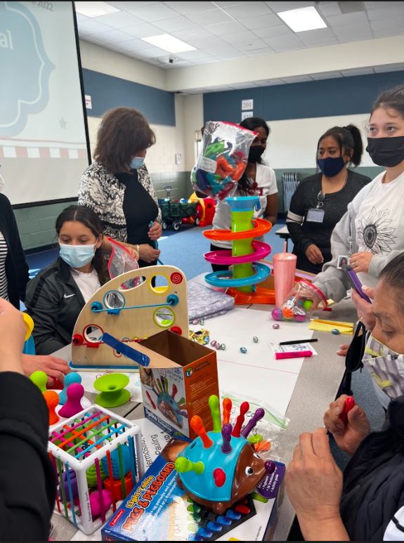 IsaacsECS's tweet photo. Our paraprofessionals attended a fun & engaging meeting yesterday where they played with new toys purchased with the funds from the @PISDEF Grant. Our paras can't wait to get these toys into the classrooms to learn and play with all of our students. #planoisdproud #grantsinaction https://t.co/sI0mzDCdvO
