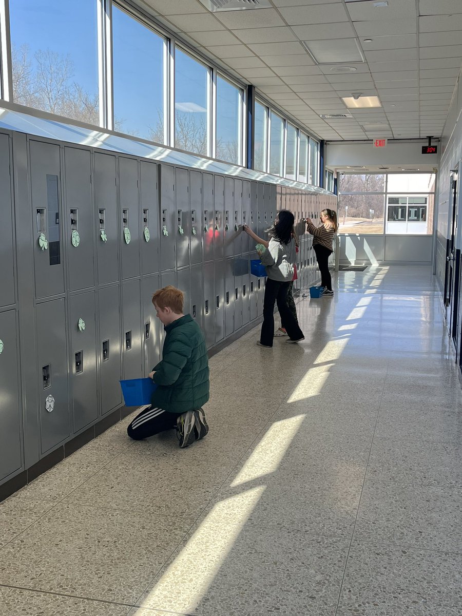 ToddHeugh's tweet photo. Larson Student Council spreading a little positivity this St. Patrick’s Day by hanging shamrocks on all student lockers.  @LarsonMS #larsonstrong https://t.co/iuOkKCgegh