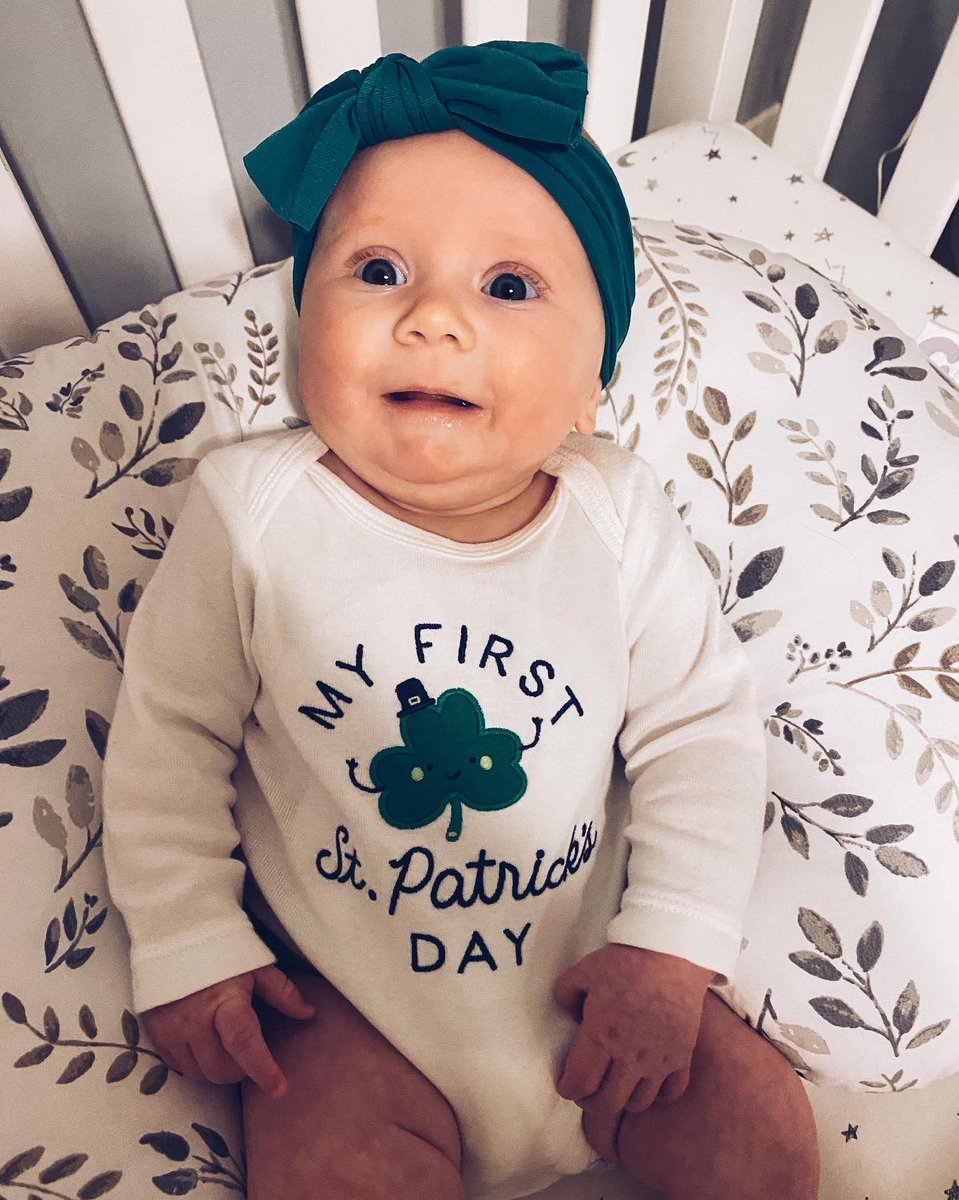 RespectSMGomez's tweet photo. Cam’s first St Patrick’s day! 

0-3 pants are too small, 3-6 are too big so no pants it is! These were the best pics we could get, she was HANGRY. 😂☘️💚 https://t.co/TCpqTfqJTG
