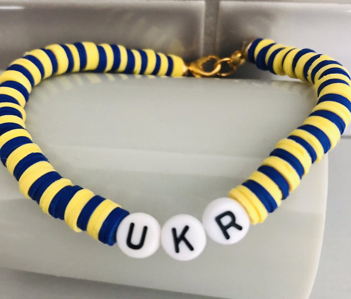 danimortimer's tweet photo. @YBB_Middle @YBB_Year6 Maddi has been making clay bead bracelets to fundraise for the people of Ukraine since last Friday evening. So far she has made 50 bracelets and raised £150. After seeing all the news reports and getting upset she wanted to do something to help 💙💛🇺🇦 https://t.co/fW7kZ0V3r4