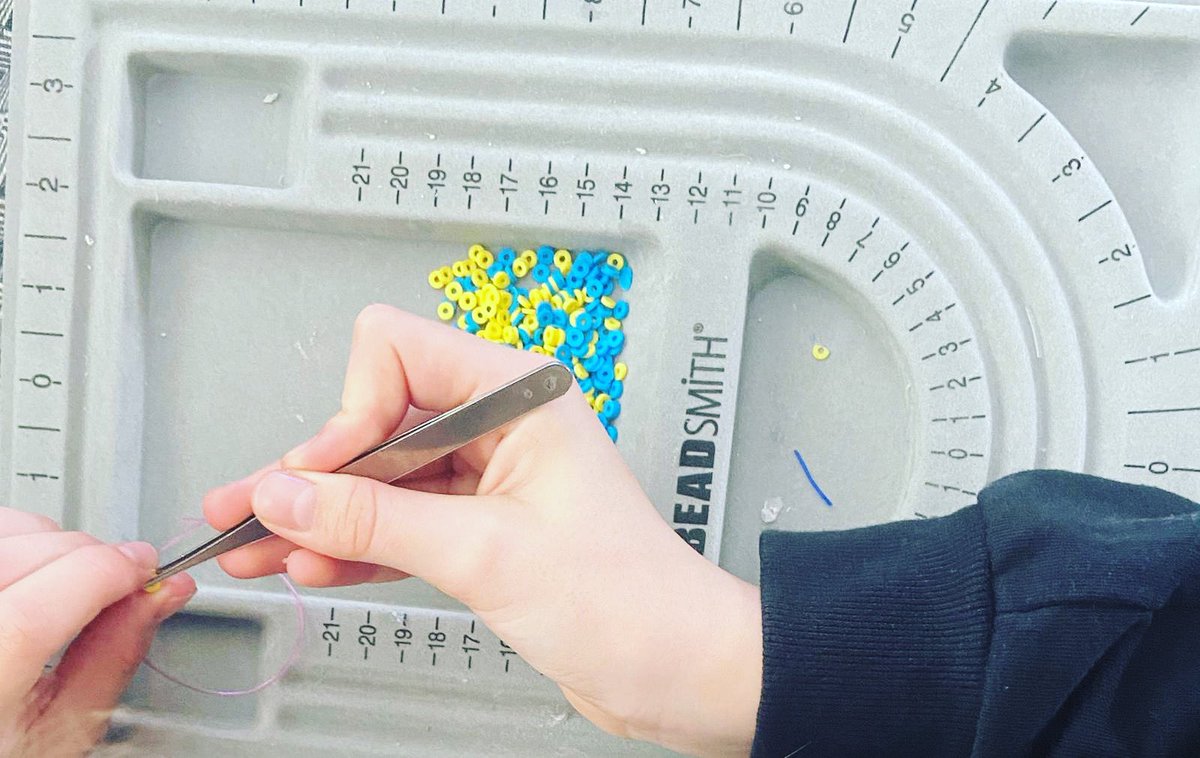 danimortimer's tweet photo. @YBB_Middle @YBB_Year6 Maddi has been making clay bead bracelets to fundraise for the people of Ukraine since last Friday evening. So far she has made 50 bracelets and raised £150. After seeing all the news reports and getting upset she wanted to do something to help 💙💛🇺🇦 https://t.co/fW7kZ0V3r4