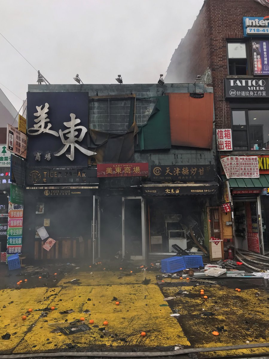 I spoke with <a href="/FDNY/">FDNY</a> and <a href="/NYPD109Pct/">NYPD 109th Precinct</a> at the scene of the five alarm fire at 40-10 Main Street, which is currently considered under control.

There are five minor injuries, which are being treated at the scene. Street closures continue, and the 7 train is still not running.