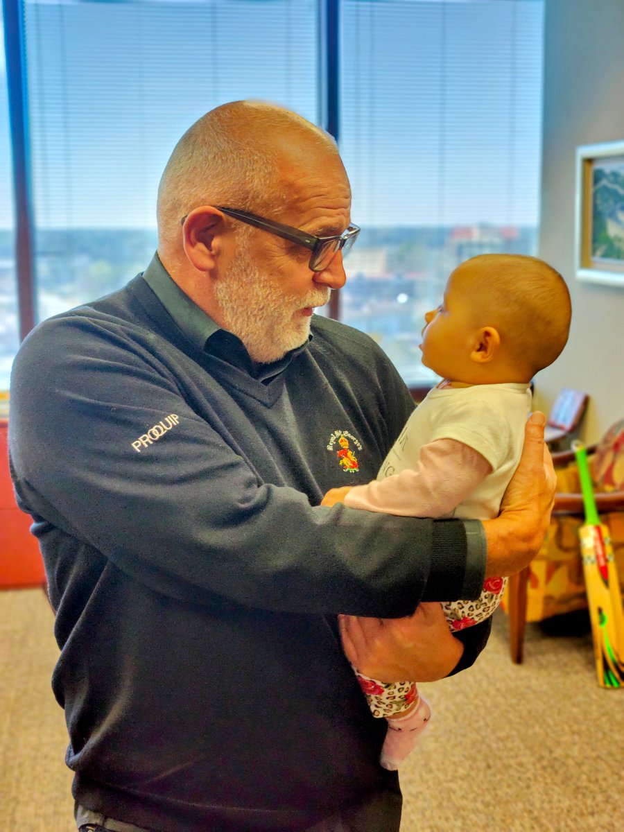 Our newest hire, Eva, has climbed the career ladder so fast, our CEO <a href="/ECapel/">Eddie Capel</a> has to keep her on his hip. #LifeAtManh